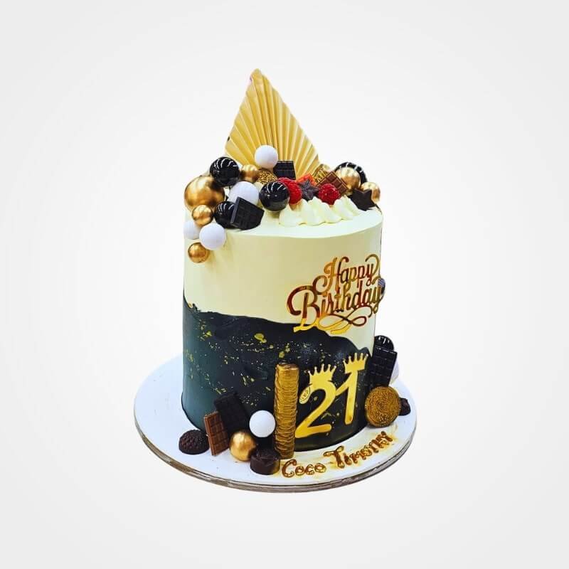 Modern Black and Gold drip Cake