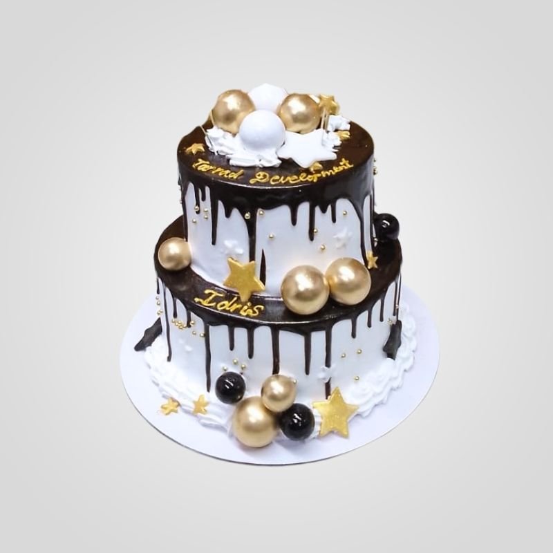 2 tier golden drip cake